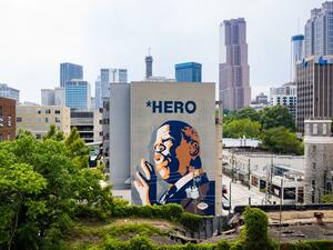  In this drone image, a mural of U.S. Rep John Lewis is seen on the side of a building on July 18, 2020 in Atlanta, Georgia. John Lewis, died at 80 years old, was an icon leader in the civil rights moment and the Voting Rights Act and served as a United States Congressman for 33 years. Elijah Nouvelage/Getty Images/AFP