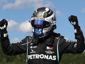 Bottas celebrates winning the Austrian Formula One Grand Prix race in Spielberg, Austria. (Photo: AFP)