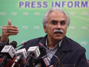 Zafar Mirza briefs the media on the coronavirus, in Islamabad, on Feb. 1. (Farooq Naeem/AFP/Getty Images)