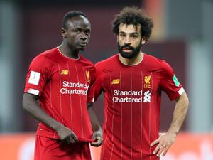 The Reds boss, who has delivered Champions League and Premier League titles, believes winning at Anfield means more than it does elsewhere (Photo: AFP)
