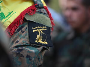 Hezbollah Funeral,where village citizens and Hezbollah soldiers carry the coffin of "Mohammad Wehbi" the Hezbollah fighter who was killed in Syria war. (Shutterstock/ File Photo)