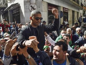 August 3, the trial opened of Algerian journalist Khaled Drareni, who has become a figurehead of press freedom in the North African country, with the prosecution calling for a four-year prison term. RYAD KRAMDI / AFP  August 3, the trial opened of Algerian journalist Khaled Drareni, who has become a figurehead of press freedom in the North African country, with the prosecution calling for a four-year prison term. RYAD KRAMDI / AFP