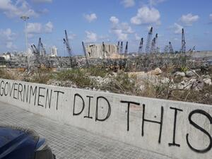 A picture taken on August 9, 2020, shows graffiti on the wall of a bridge overlooking the port of Beirut, the site of the explosion which killed at least 154 people and devastated swathes of the capital. ANWAR AMRO / AFP A picture taken on August 9, 2020, shows graffiti on the wall of a bridge overlooking the port of Beirut, the site of the explosion which killed at least 154 people and devastated swathes of the capital. ANWAR AMRO / AFP