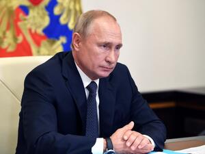 Russian President Vladimir Putin chairs a meeting with members of the government via a teleconference call at the Novo-Ogaryovo state residence outside Moscow on August 11, 2020. Russia has developed the first vaccine offering "sustainable immunity" against the coronavirus, President Vladimir Putin announced on August 11. Alexey NIKOLSKY / SPUTNIK / AFP