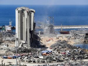 Diggers remove earth at the blast site next to the silos at the port of Beirut on August 16, 2020, in the aftermath of the massive explosion there that ravaged Lebanon's capital. ANWAR AMRO / AFP Diggers remove earth at the blast site next to the silos at the port of Beirut on August 16, 2020, in the aftermath of the massive explosion there that ravaged Lebanon's capital. ANWAR AMRO / AFP