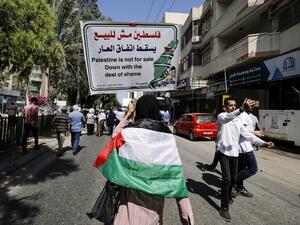 Palestinians shout slogans during a protest against the United Arab Emirates' deal with Israel to normalise relations, in Gaza City, on August 19, 2020. MOHAMMED ABED / AFP