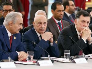 In this file photo taken on May 29, 2018 (L to R) Libyan strongman Khalifa Haftar, speaker of the eastern-based parliament Aguila Saleh Issa, and head of the Tripoli-based UN-recognised unity government Fayez al-Sarraj, attend an International Congress on Libya at the Elysee Palace in Paris. Etienne LAURENT / POOL / AFP