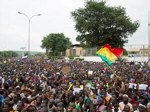 Demonstrators gather during a protest to support the Malian army and the National Committee for the Salvation of the People (CNSP) in Bamako, Mali, on August 21, 2020. Mali awoke on August 19, 2020, to a new chapter in its troubled history after rebel military leaders forced Malian President Boubacar Keita from office, prompting its West African neighbours to threaten border closures and sanctions against the coup leaders. ANNIE RISEMBERG / AFP