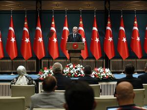 Turkish President Recep Tayyip Erdogan (C) holds a press conference following the weekly cabinet meeting at the Presidential Complex in Ankara on August 24, 2020. Adem ALTAN / AFP