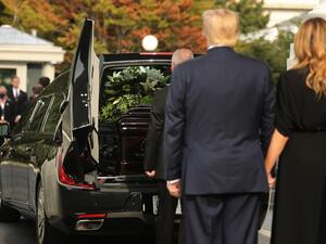 U.S. President Donald Trump and first lady Melania Trump look on as Robert Trumps casket is loaded into a hearse at the North Portico of the White House following his funeral service on August 21, 2020 in Washington, DC. Robert Trump passed away on August 15 at the age of 71. In a statement, President Trump wrote, He was not just my brother, he was my best friend." Chip Somodevilla/Getty Images/AFP CHIP SOMODEVILLA / GETTY IMAGES NORTH AMERICA / Getty Images via AFP