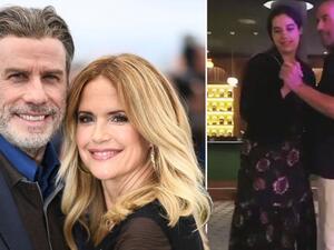 جون ترافولتا وزوجته كيلي 