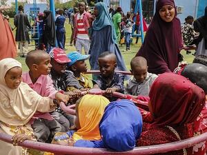 The bill will also allow child marriage once a girl's sexual organs mature. Pictured: Children play during the Muslim festival Eid Al-Adha, the Festival of Sacrifice, at a recreational park in Mogadishu, on July 31 (AFP)