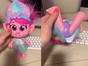 A Trolls doll has been pulled from shelves after a disgusted mother shared a video of it making 'sexual sounds' when a button on its 'privates' is pressed. (Twitter)