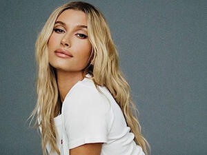 The 23-year-old chose to wear Muaddi’s glitzy Lupita Suede Mules in black