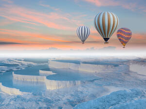Hot air balloon flying over spectacular Pamukkale  (Shutterstock)	