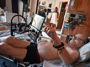 In this file photo taken on August 12, 2020 Alain Cocq, suffering from an orphan desease of the blood, rests on his medical bed in his flat in Dijon, northeastern France. Cocq announced on September 4, 2020 that he had been refused by the French President in his request to help him die and that he will cease all treatment from this day on. (AFP)