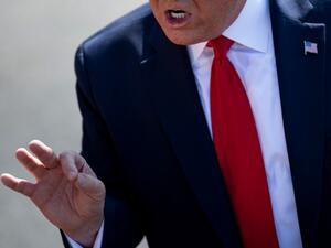 In this file photo US President Donald Trump makes a point during a press conference with US Labor Secretary Alexander Acosta early July 12, 2019 at the White House in Washington, DC. US President Donald Trump has ordered government agencies to end employee training sessions on fighting racism because they amount to "un-American propaganda," the White House said on September 4. Brendan Smialowski / AFP