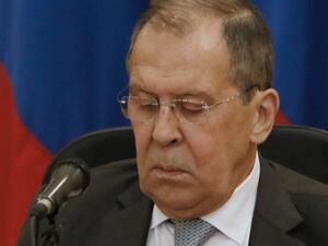 Russian Foreign Minister Sergei Lavrov checks his notes during a joint press conference with his Syrian counterpart (unseen) after meeting in Syria's capital Damascus, on September 7, 2020. LOUAI BESHARA / AFP