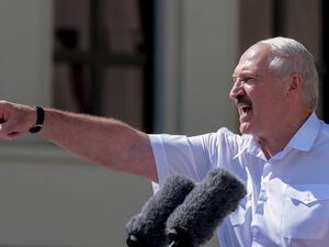 In this file photo taken on August 16, 2020 Belarus' President Alexander Lukashenko gestures as he delivers a speech during a rally held to support him in central Minsk. Belarusian President Alexander Lukashenko on September 8, 2020 suggested that Russia would be next if his regime falls in the face of a wave of mass demonstrations. "You know what we concluded with the Russian establishment and leadership? If Belarus falls, Russia will be next," state news agency RIA Novosti quoted Lukashenko as saying in a