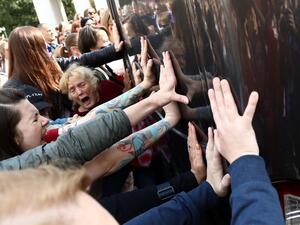 Women block a police bus during a rally to protest against the presidential election results in Minsk on September 12, 2020. Belarus strongman Alexander Lukashenko, 66, who has been in power for 26 years, has vowed that he will not give up power to the opposition, which claims its candidate Svetlana Tikhanovskaya was the rightful winner of the August 9 polls. TUT.BY / AFP