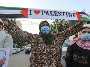 Palestinians protest in Gaza City against Israeli normalisation deals with the United Arab Emirates and Bahrain on September 15, 2020, hours ahead of a signing ceremony at the White House. The decision by the UAE and Bahrain to normalise ties with Israel breaks with decades of consensus within the Arab world that a peace deal with the Palestinians is a prerequisite for establishing relations with the Jewish state. MAHMUD HAMS / AFP