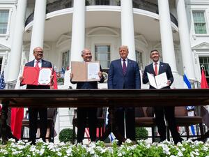 (L-R)Bahrain Foreign Minister Abdullatif al-Zayani, Israeli Prime Minister Benjamin Netanyahu, US President Donald Trump, and UAE Foreign Minister Abdullah bin Zayed Al-Nahyan hold up documents after participating in the signing of the Abraham Accords where the countries of Bahrain and the United Arab Emirates recognize Israel, at the White House in Washington, DC, September 15, 2020. Israeli Prime Minister Benjamin Netanyahu and the foreign ministers of Bahrain and the United Arab Emirates arrived Septembe