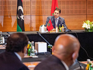 Nasser Bourita, Morocco’s Minister of Foreign Affairs speaks to representatives of Libya’s rival administrations in the coastal town of Bouznika, south of Rabat, on September 6. (AFP)