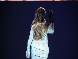 A picture taken on September 4 shows a charred wooden statue of Melania Trump, on display during an exhibition called F*** Off Illusion by American artist Brad Downey in Koper (AFP)