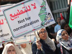 Palestinians gather to protest a deal between the United Arab Emirates (UAE) and Israel to normalize ties in Gaza City, Gaza on August 19, 2020. Photo: AFP Forum via Anadolu Agency/ Mustafa Hassona