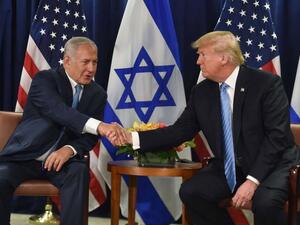 US President Donald Trump shakes hands with Israeli Prime Minister Binyamin Netanyahu. (AFP)