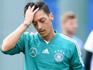 The enigmatic playmaker quit international duty in 2018 after being singled out for a meeting with Recep Tayyip Erdogan and poor performances (Photo: AFP)