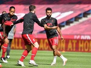 The Reds centre-back was quick to stress that the club has never lost faith in the quality of their Egyptian star (Photo: AFP)