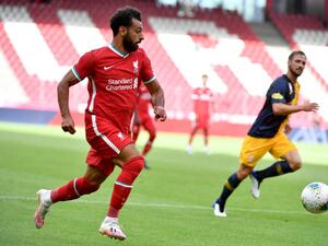 The German head coach talked up the Egyptian forward's contribution to the Reds' cause ahead of a heavyweight meeting with Chelsea (Photo: AFP)