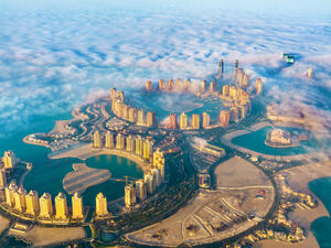 Aerial view of the Pearl-Qatar island in Doha through the morning fog. Qatar, the Persian Gulf (Shutterstock)