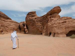 Saudian walking in Madain Saleh archeological site, Saudi Arabia. (Shutterstock/ File Photo)