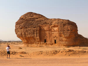 Al-Ula, Saudi Arabia: A tourist photographs Area C tombs at Madain Saleh Heritage Site. (Shutterstock/ File Photo)