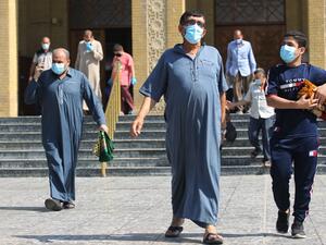 Iraqi Sunni Muslims leave al-Firdous Mosque in Baghdad at the end of the Friday prayer on October 9, 2020, as Iraqi authorities allowed group prayers in mosques with social distancing for the first time since a lockdown was imposed to fight the coronavirus pandemic. Iraq registered more than 390,000 Covid-19 infections so far in the pandemic, according to religious authorities in the country where the novel coronavirus has claimed some 10,000 lives since the winter. AHMAD AL-RUBAYE / AFP