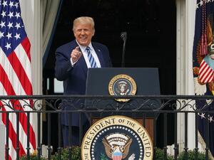 US President Donald Trump greets supporters after speaking about law and order from the South Portico of the White House in Washington, DC, on October 10, 2020. Trump spoke publicly for the first time since testing positive for Covid-19, as he prepares a rapid return to the campaign trail just three weeks before the election. MANDEL NGAN / AFP