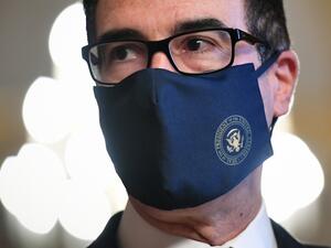 In this file photo US Treasury Secretary Steven Mnuchin speaks to reporters after briefing Senate Majority Leader Mitch McConnell, R-KY, on their meeting with House Speaker Nancy Pelosi, D-CA, and Senate Minority Leader Chuck Schumer, D-NY, for coronavirus relief talks at the US Capitol in Washington, DC on August 3, 2020. (AFP/File Photo)