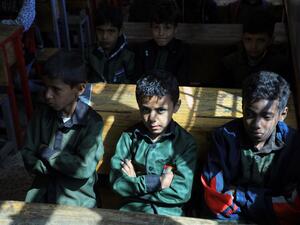 Yemeni pupils attend class on the first day of the new academic year in the capital Sanaa, on October 17, 2020. Mohammed HUWAIS / AFP