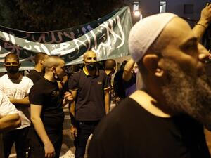 Arab-Israeli protesters gather outside the residence of the French Ambassador to Israel, in Tel Aviv on October 24, 2020, in response to comments by French President Emmanuel Macron defending cartoons of the Prophet Mohammed. JACK GUEZ / AFP