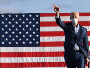 Democratic presidential nominee and former Vice President Joe Biden waves to supporters before speaking at a Drive-In rally at Dallas High School, in Dallas, Pennsylvania, on October 24, 2020. Angela Weiss / AFP