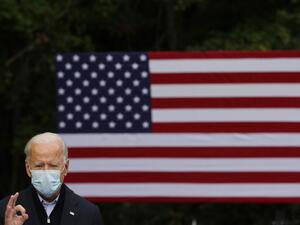 Democratic presidential nominee Joe Biden delivers remarks in the parking lot of the United Food and Commercial Workers International Union Local 951 while campaigning October 02, 2020 in Grand Rapids, Michigan. Biden said he tested negative twice Friday for the coronavirus after it was reported that U.S. President Donald Trump and first lady Melania Trump tested positive for COVID-19. Chip Somodevilla/Getty Images/AFP CHIP SOMODEVILLA / GETTY IMAGES NORTH AMERICA / Getty Images via AFP