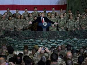 President Donald Trump speaks to US troops during a surprise Thanksgiving 2019 visit to Bagram air base in Afghanistan (AFP Photo/Olivier Douliery)