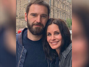 The Cougar Town actress revealed she first met Johnny when he was living with mutual friend Ed Sheeran