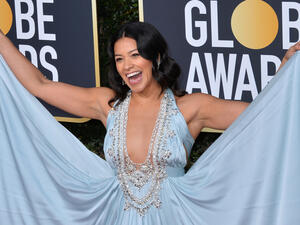 Gina also revealed she once had to be sewn into a dress after her stylist, Lauren Rodriguez, told her it didn't fit.