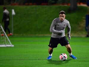 The 28-year-old, who remains on the books at Anfield with the transfer window now closed, is taking in a period of self-isolation (Photo: AFP)