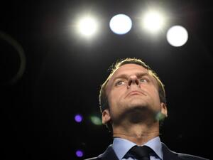In this file photograph taken on April 4, 2017, then French presidential election candidate for the En Marche ! movement Emmanuel Macron looks on prior to a debate organised by the French private TV channels BFM TV and CNews, between the eleven candidates for the French presidential election, on April 4, 2017 in La Plaine-Saint-Denis near Paris. Simultaneously battling the twin crises of the second wave of the coronavirus pandemic and a resurgence in Islamist attacks, French President Emmanuel Macron faces 
