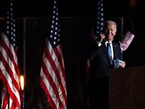 Democratic presidential nominee Joe Biden (L) and wife Jill Biden arrive onstage to address supporters during election night at the Chase Center in Wilmington, Delaware, early on November 4, 2020. Roberto SCHMIDT / AFP