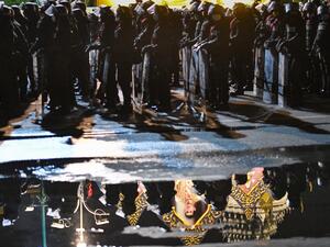 Riot police stand guard as pro-democracy protesters take part in an anti-government demonstration in Bangkok on November 8, 2020. Mladen ANTONOV / AFP